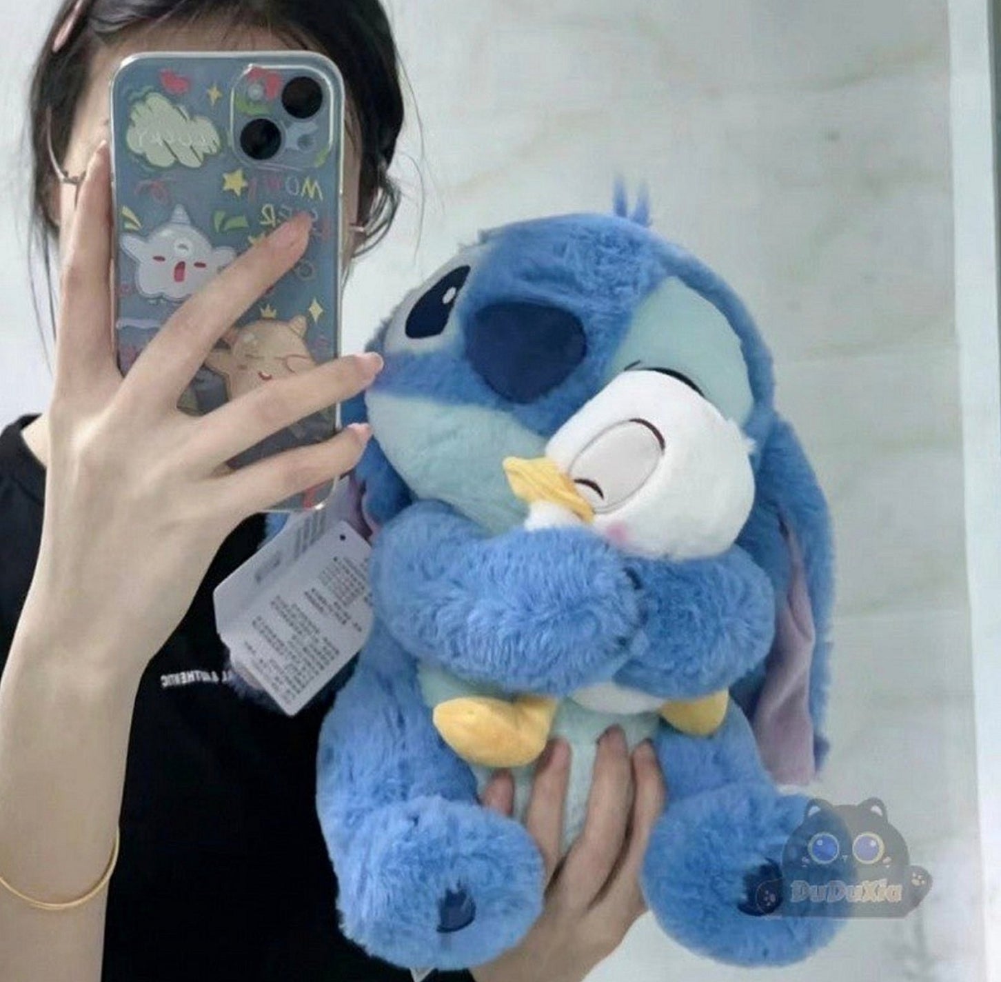 Stitch plišana igračka sa pačetom